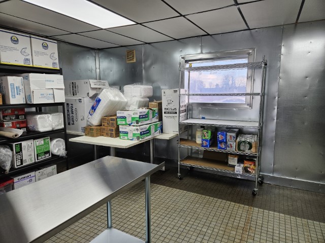 Image of the catering sections's available cabinets and tables.